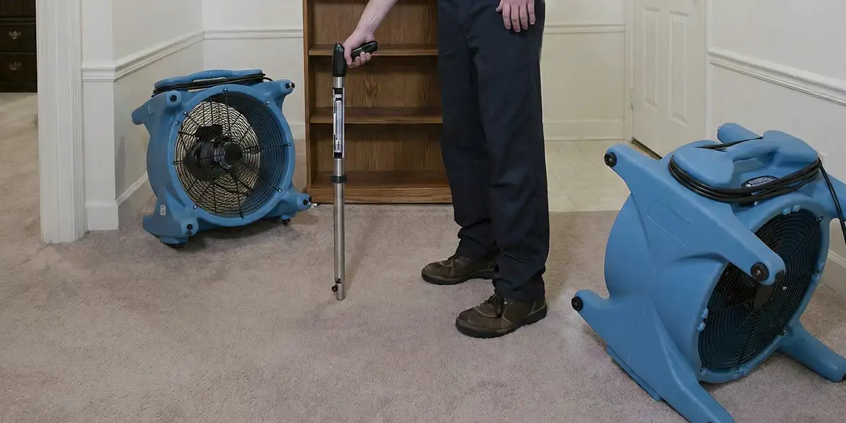 emergency water removal equipment deployed to dry a flooded residential interior in Detroit, MI