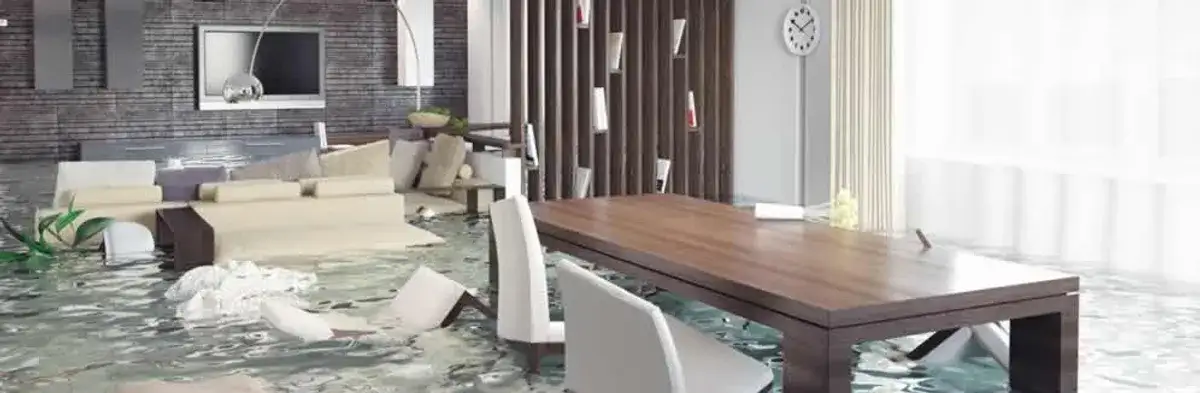 home interior affected by water damage with flooded floors and displaced furniture in Detroit, MI